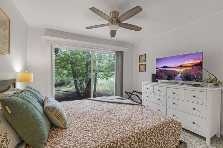Sliding glass door in the primary bedroom. Sliding glass door in the primary bedroom.