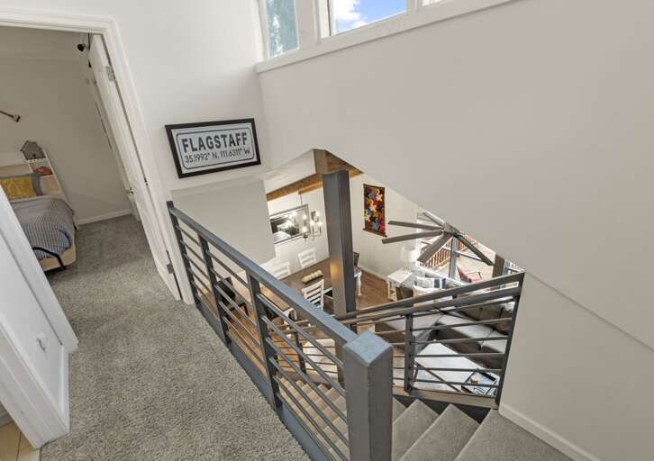 Stairs leading to the remaining bedrooms Stairs leading to the remaining bedrooms