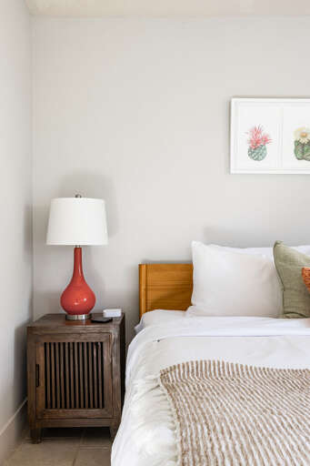 Lamp for light and night stands for plenty of storage.