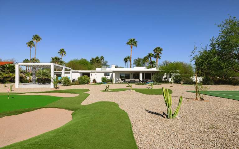 Mini golf course features several bunkers.