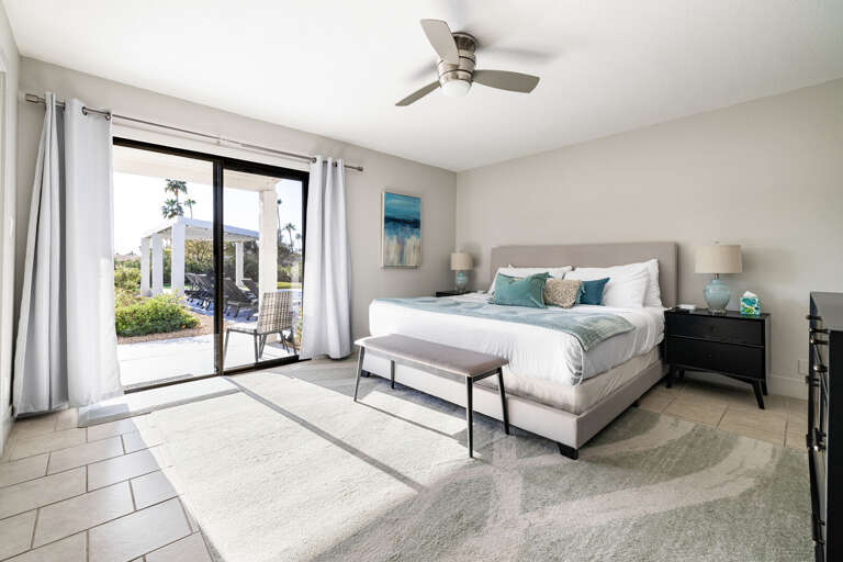 Sliding glass doors lead outside to the back yard.