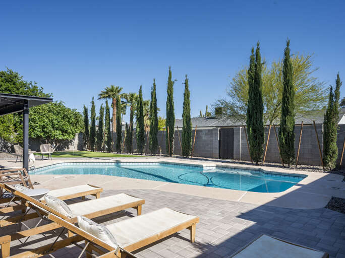 Backyard Pool with lounge chairs