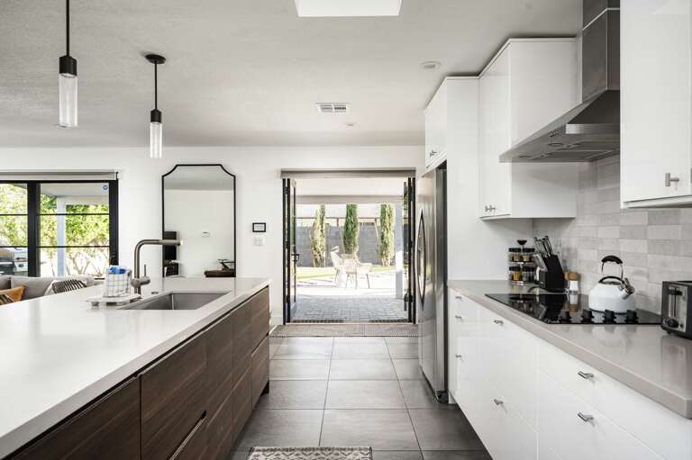 View of backyard entry from kitchen