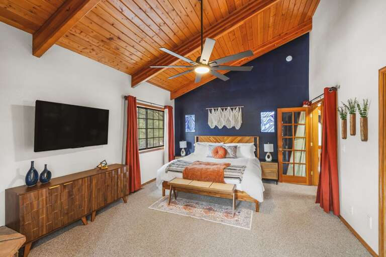 Primary bedroom with TV