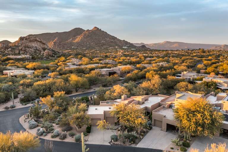 Scenic desert neighborhood with stunning mountain views and beautiful Arizona sunsets.