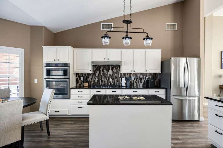 Gather, cook, and make memories in this open, inviting kitchen space.