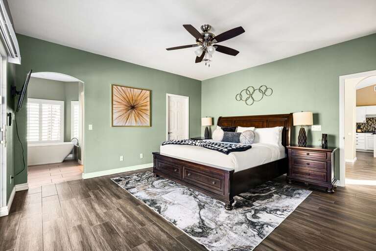 Unwind in the spacious primary suite with a King-size bed and en-suite bathroom!