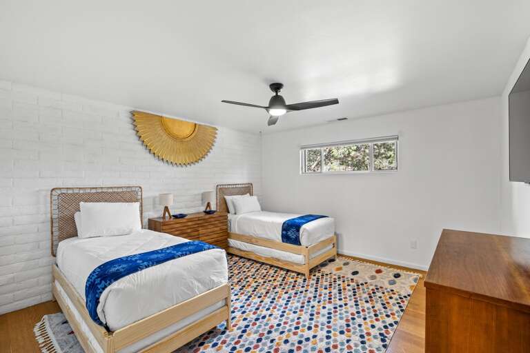 Perfect for kids, friends, or travel companions — a cozy twin bedroom retreat. (Twin room can be configured with two or four twin beds upon special request)
