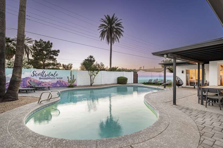 Lounge poolside under swaying palms, soak in the Arizona sunsets, and unwind in your own backyard oasis.