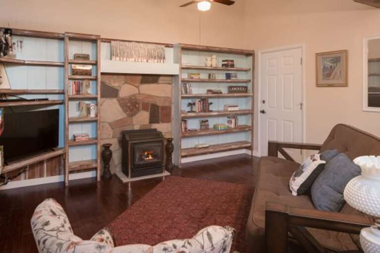 Entertainment Room: With a large assortment of books and movies to watch on the TV, you are sure to
