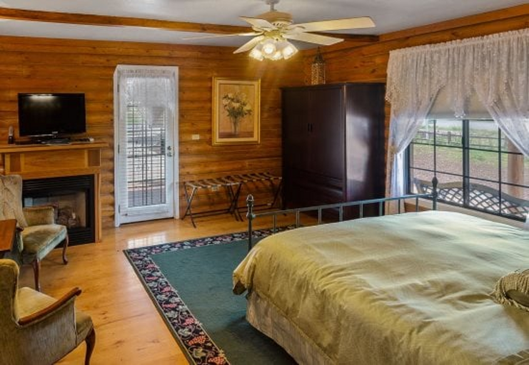 It also includes a cozy fireplace and a private entrance for added convenience.