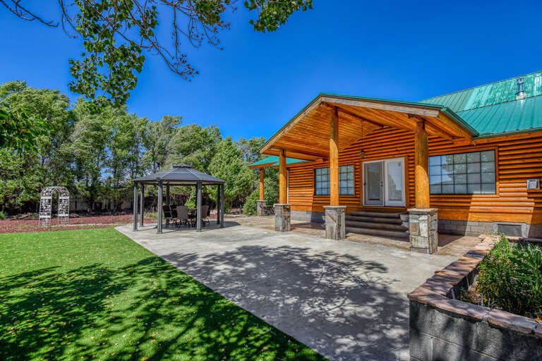 Outdoor Gazebo & Grill: Enjoy mountain views while dining al fresco in your private backyard.