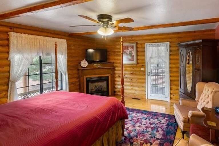 Welcome to the ROSE ROOM at Quarter Horse Inn by PORTER. This cozy, log cabin-style room in a historic private inn combines vintage charm of bygone era with modern comfort.