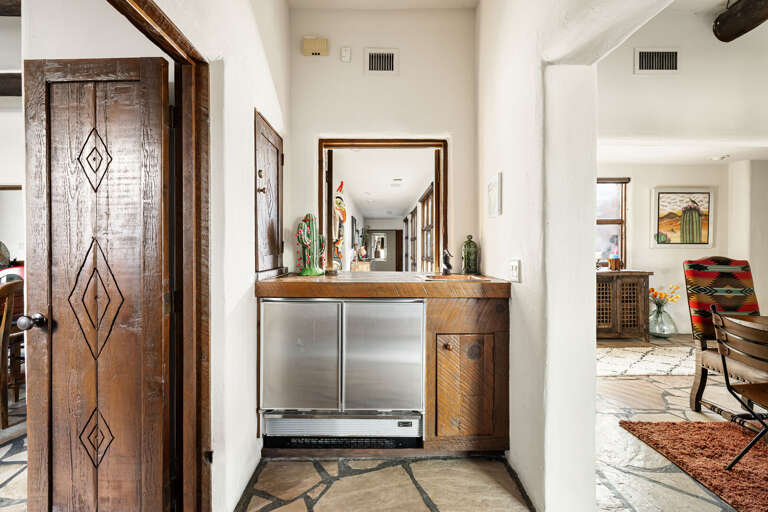 Enjoy the convenience of a built-in beverage station, perfect for keeping drinks chilled and refreshments close at hand.