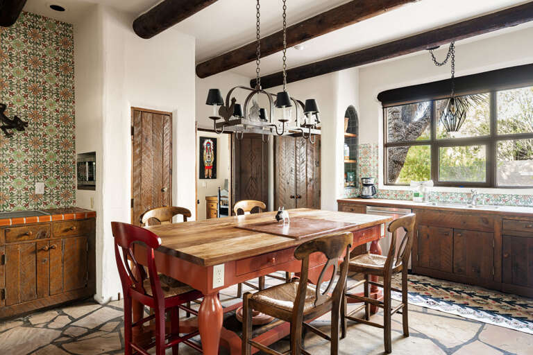 Gather around the oversized island, perfect for preparing meals, enjoying breakfast, or spending time with family and friends.