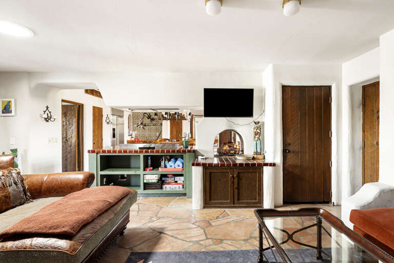 The open layout connects the family room and gourmet kitchen, creating the perfect space for relaxing, entertaining, and spending time together.