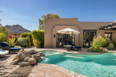 Relax by the sparkling pool and spa surrounded by lush desert landscaping, sunny lounge areas, and beautiful Southwestern architecture.