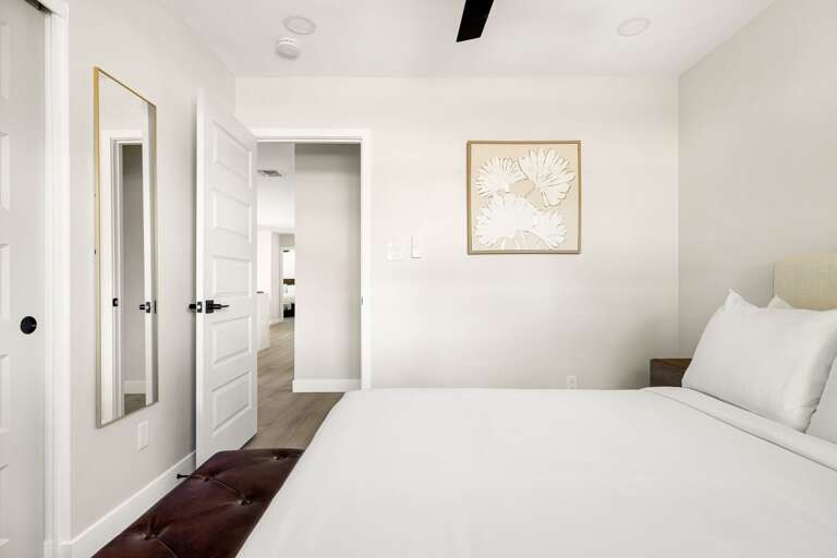 Bright and inviting bedroom with stylish finishes, ample space, and modern comfort throughout.
