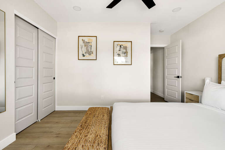 Comfortable and modern bedroom with clean design, cozy furnishings, and a bright airy feel.