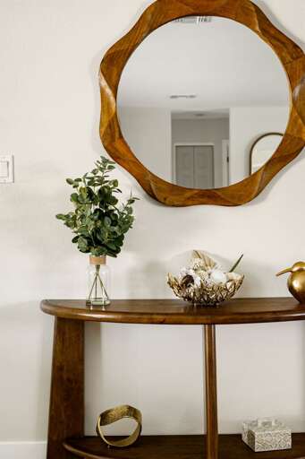 Elegant entryway décor featuring designer accents and a welcoming modern aesthetic.