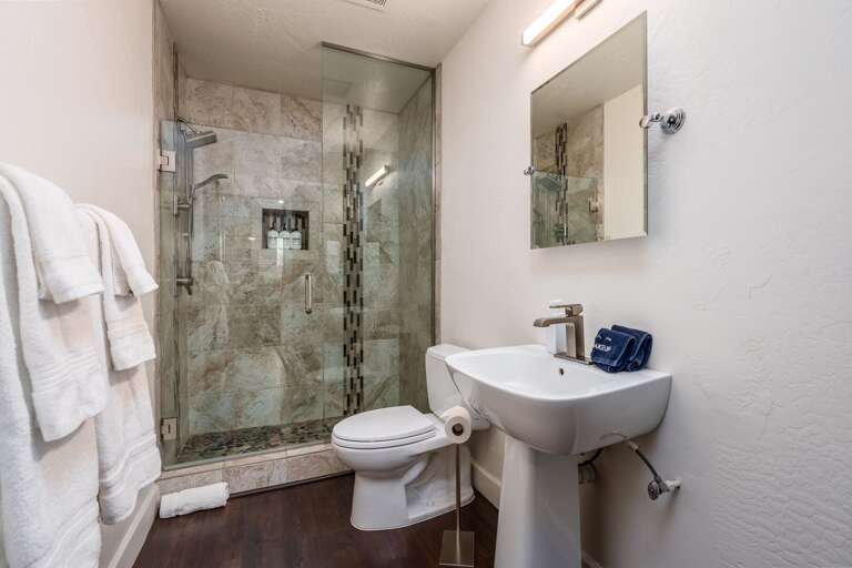 Enjoy a beautifully updated bathroom with a sleek walk-in shower and modern finishes throughout.