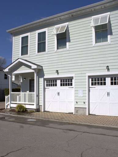 Vacation Rental: Pale Panels, Porch And Paired Garages