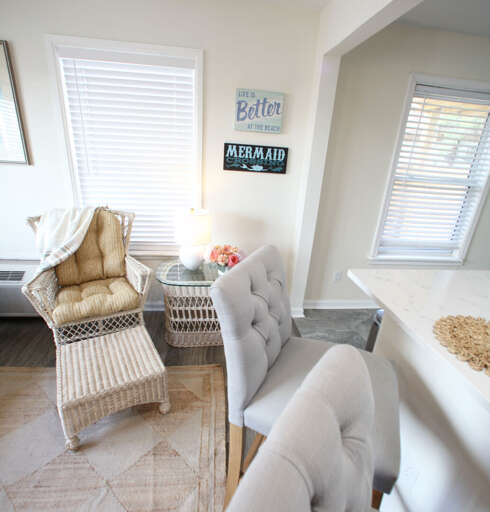 Living room and bar area share a common space. Living room and bar area share a common space.