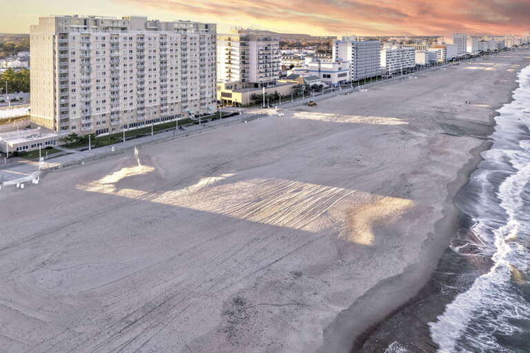 This vacation rental is located directly on the spacious beach near the inlet.