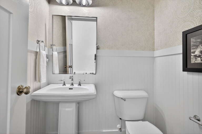 Powder room just off the dining room.