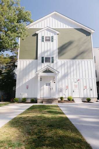 Access to private onsite parking from the rear alley. The main entrance is secured with a keypad for extra privacy and safety precautions.