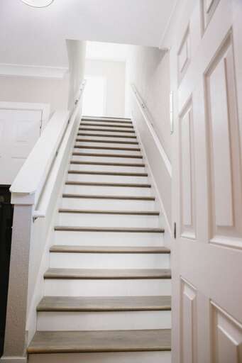 Access the rental using a single flight of stairs leading to #200, your home away from home.