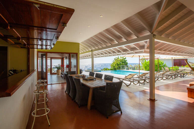 Curacao Rental Home: The dining table with pool &amp; sea view