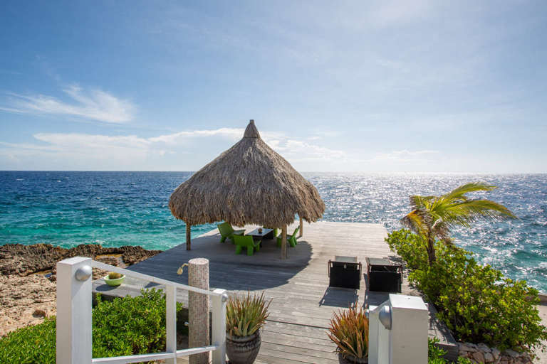 Sea dock surrounded by turquois Sea at Villa Sea paradise Curacao