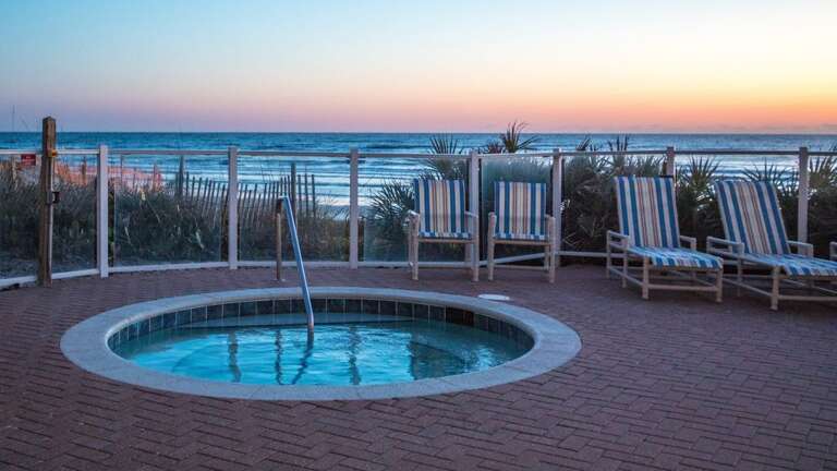 Hot tub is oceanfront as is the pool.