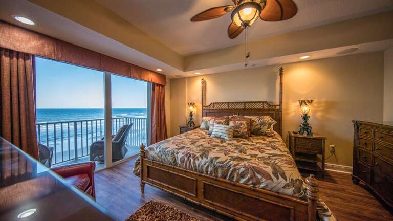 Tommy Bahama Master Bedroom Suite w/balcony, breathtaking views of Atlantic, fireplace, ensuite bath and oversized jacuzzi tub.