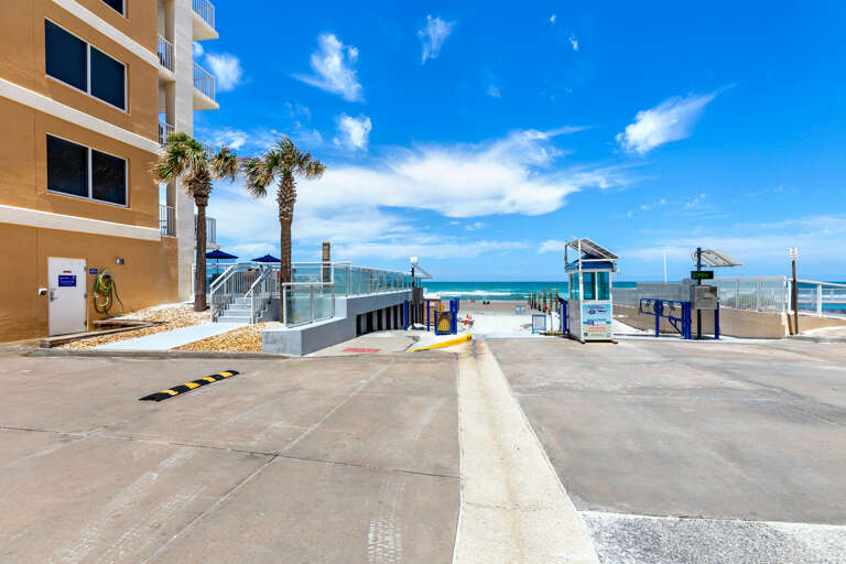 Ramp is adjacent to condo - easy access to/from beach for people, wagons, wheelchairs