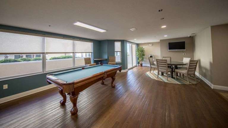 Club House on 1st Floor w/Billiard Table, gym, card tables, kitchen, restrooms Club House on 1st Floor w/Billiard Table, gym, card tables, kitchen, restrooms