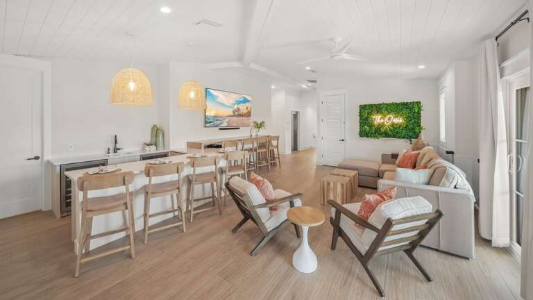 Club Room with Bar Seating, Soft Seating, TVs, and Gaming Systems