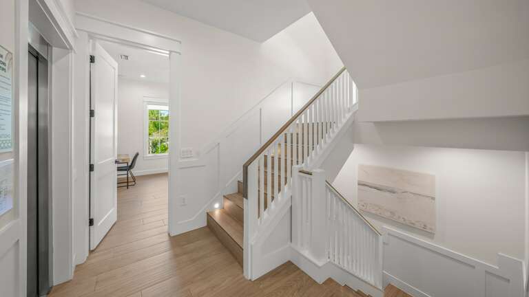 Staircase and Elevator to All Levels