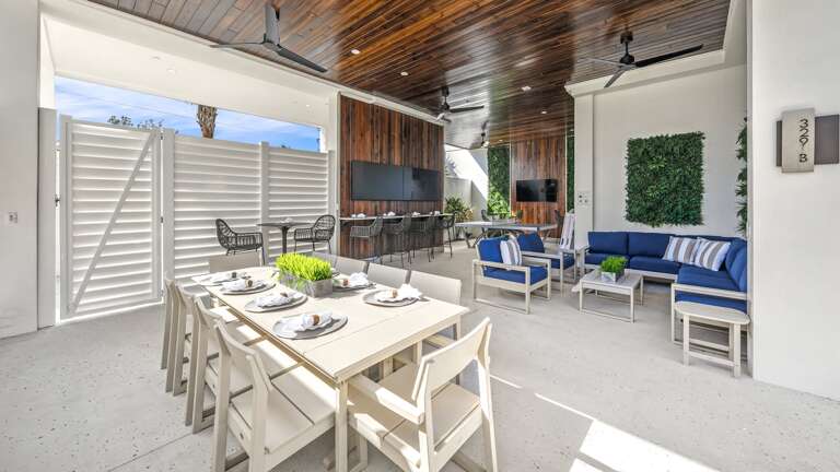 Daytime - Covered Pool Area - 3 HD TVs - Outdoor Dining - BBQ Grill - Ping Pong - and Lounge Area