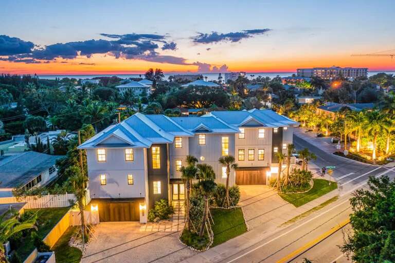 Large Building At Dusk, Sunset Backdrop, Palm-lined Path