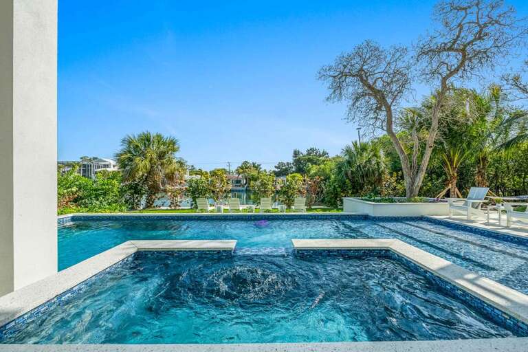 Heated Pool, Spa, Sunshelf, and Slide Heated Pool, Spa, Sunshelf, and Slide