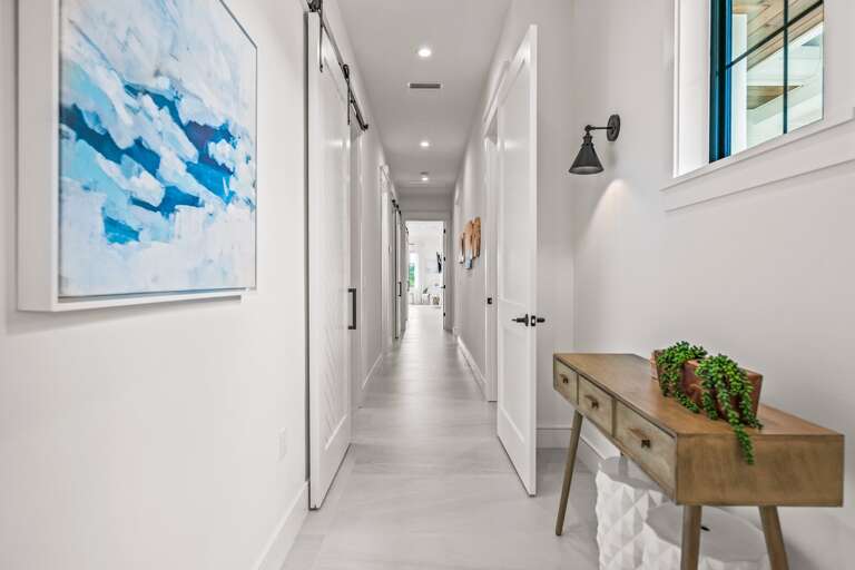 Hallway to Master Bedroom 1 and 2, and Bedroom 6 Hallway to Master Bedroom 1 and 2, and Bedroom 6