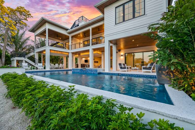 Twilight - Rear Elevation of this One of a Kind Home Twilight - Rear Elevation of this One of a Kind Home