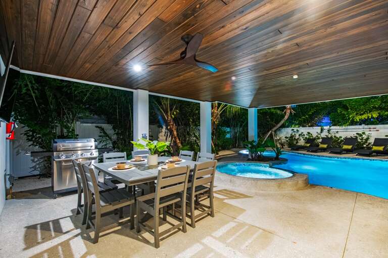 Outdoor Dining Under Covered Pool Patio