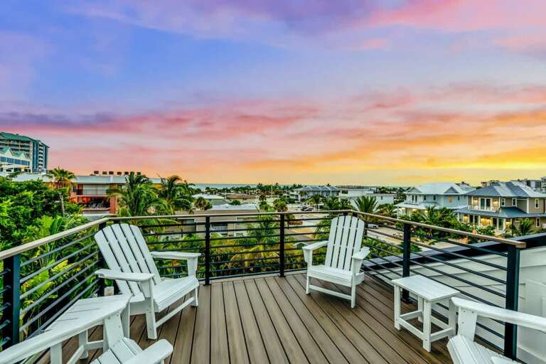 Sunset-soaked Balcony View From A Scenic Vacation Rental