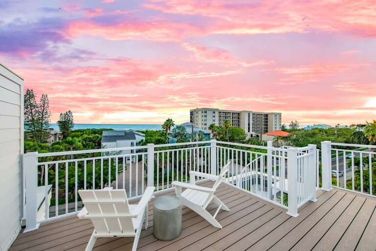 Balcony View Of Vivid Sunset Sky Above Buildings