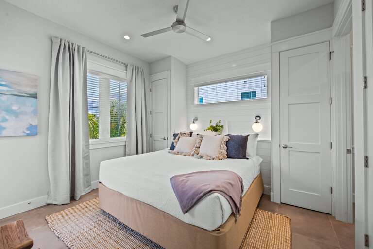 Bedroom 2 - King Bed, En Suite Bath, Balcony Access, Pool View