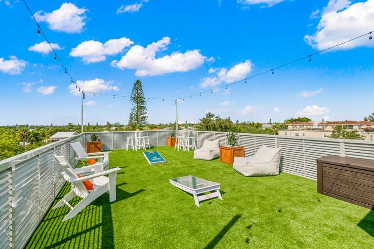 Rooftop - Gaming Area - Cornhole, Jenga, Connect 4 - Checkers - Large HDTV - City and Gulf Views Rooftop - Gaming Area - Cornhole, Jenga, Connect 4 - Checkers - Large HDTV - City and Gulf Views