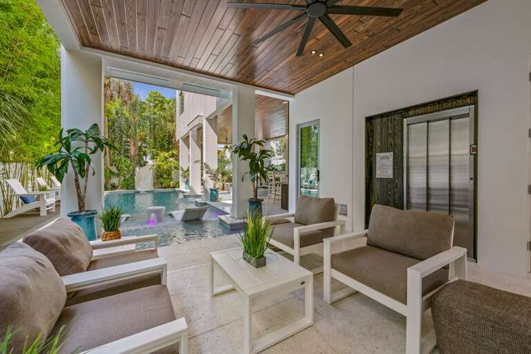 Covered Pool Area - Entry Way - Elevator Service to ALL Floors Covered Pool Area - Entry Way - Elevator Service to ALL Floors